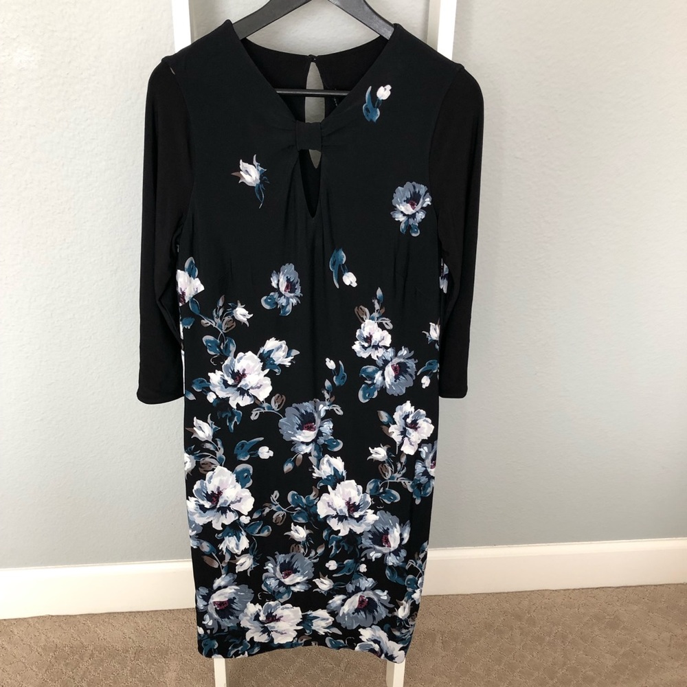 WHBM reversible dress. Size 6 reverses to solid black. Cute neckline.